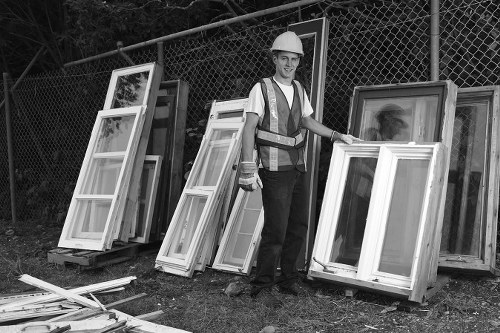 Professionals clearing furniture in a Walthamstow home